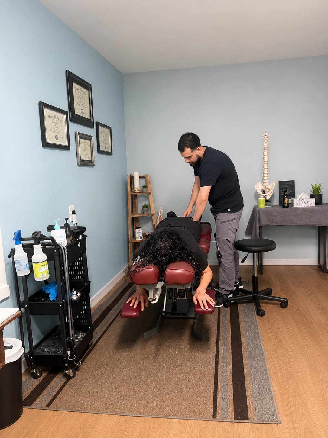 Dr. Kevin Graciano adjusting a patient at Graciano Family Chiropractic in Waxahachie, TX
